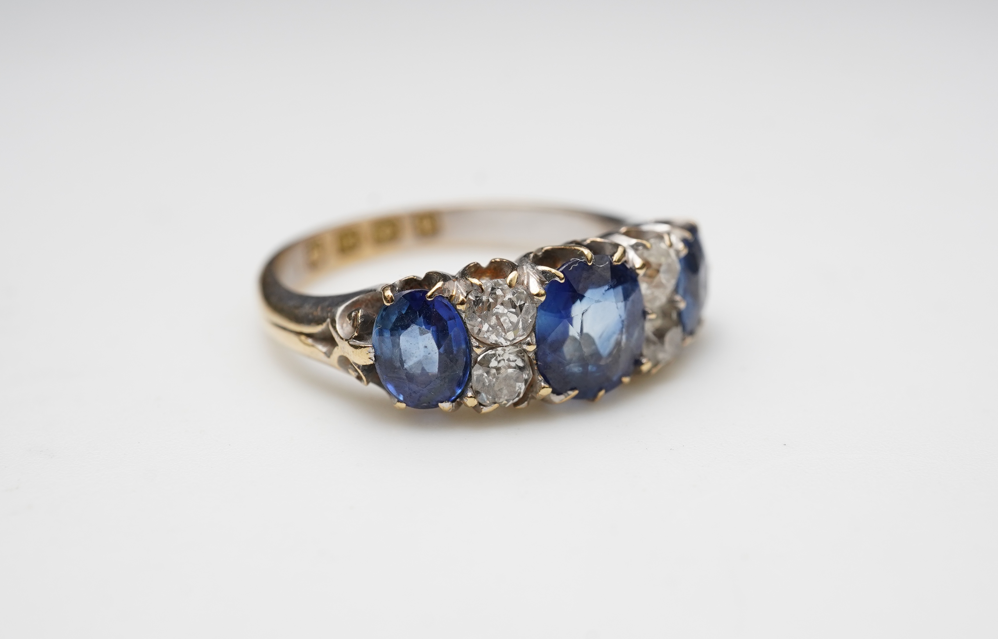 A Victorian sapphire and diamond ring, circa 1889